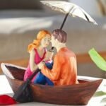 Couple on Boat Decorative Showpiece